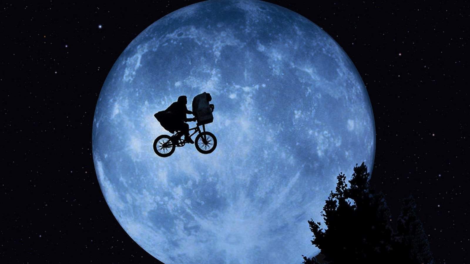 elliott and et in front of the moon