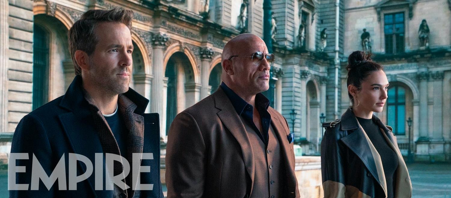 Red Notice: Gal Gadot, Ryan Reynolds e Dwayne Johnson nella nuova foto del film 1 red notice immagine